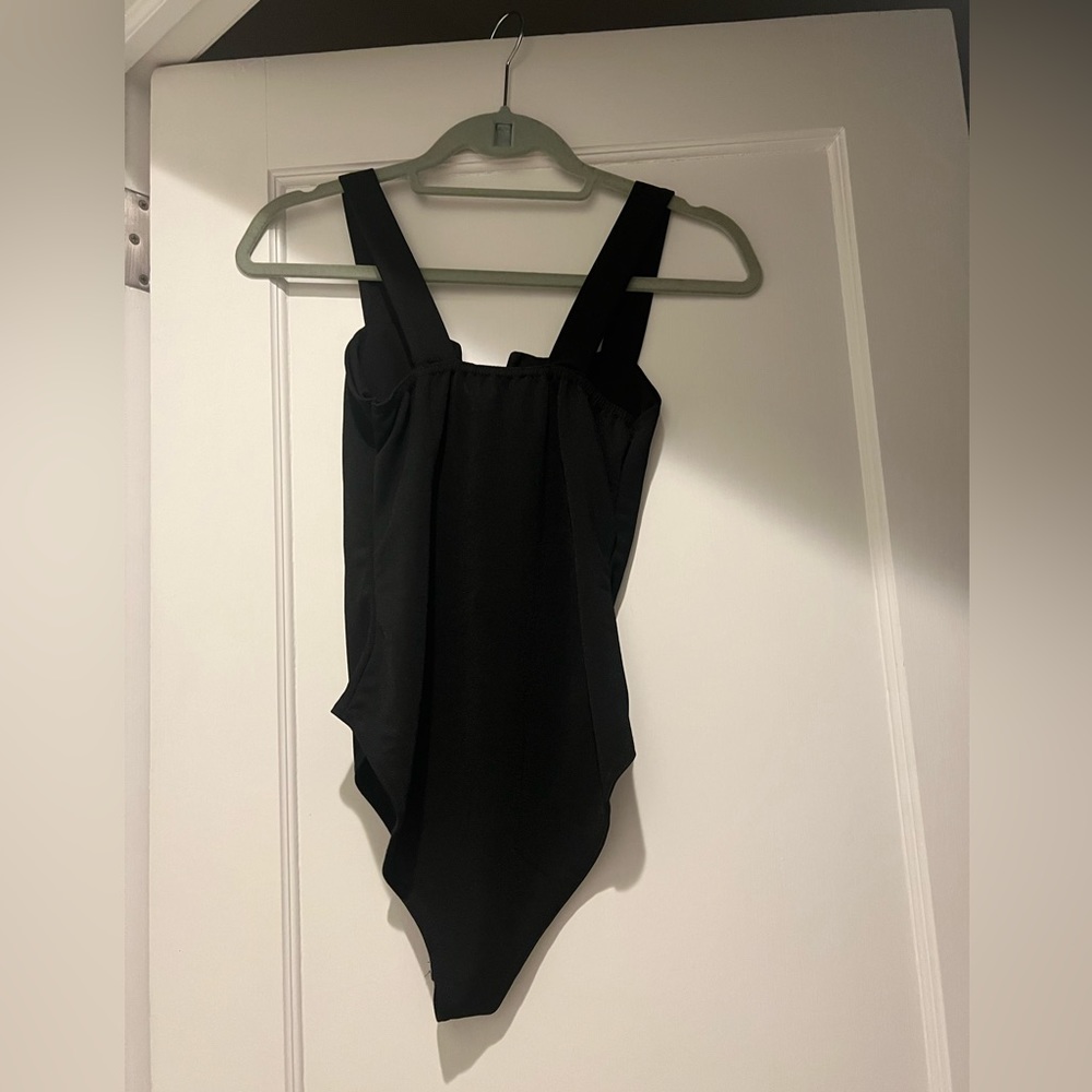 NWT Nasty gal size 4 black snap body suit